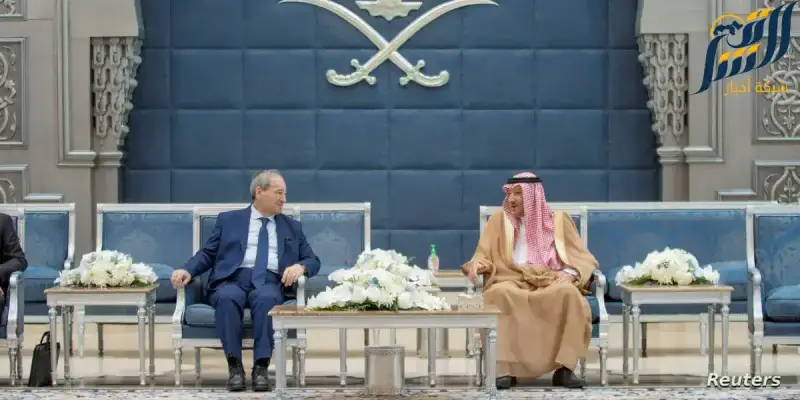 وزير الخارجية السعودي ونظيره السوري