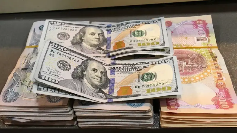 سعر 100 دولار في العراق
