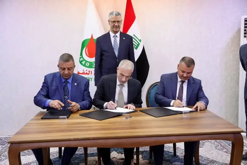 جانب من توقيع الاتفاق