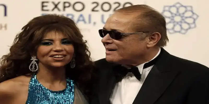 الفنان المصري الراحل محمود عبد العزيز والإعلامية بوسي شلبي