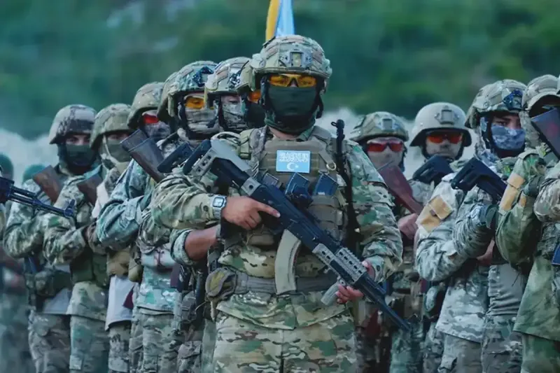 مقاتلين من الإيغور للصين