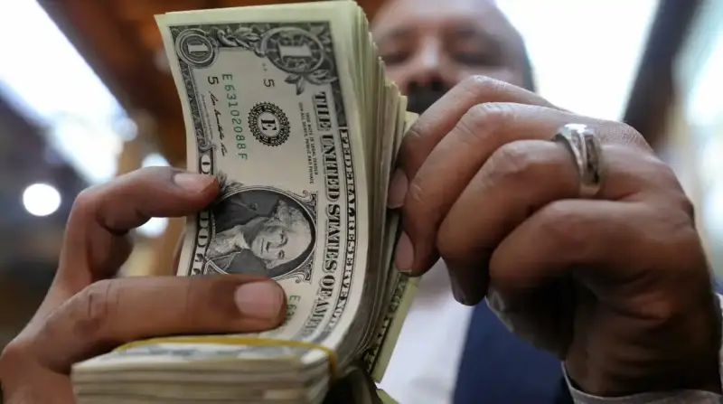 سعر صرف 100 الدولار في العراق