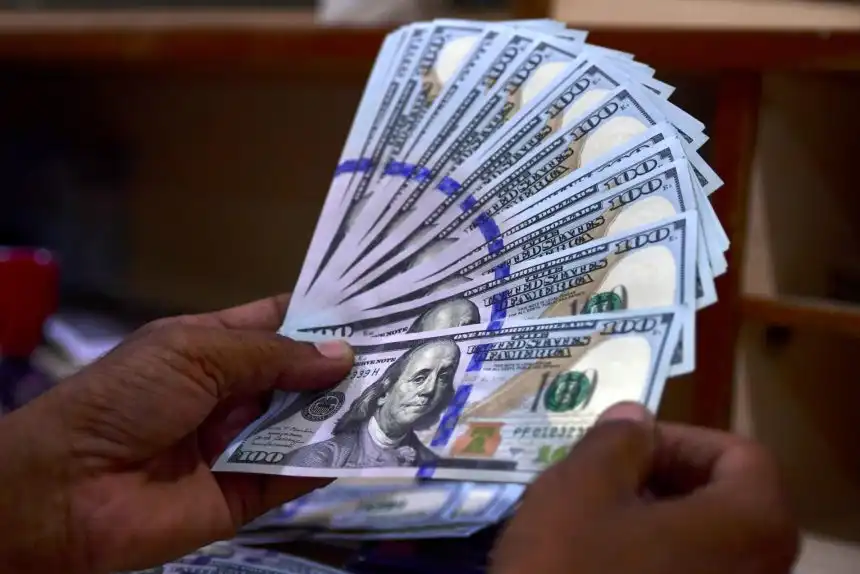 سعر صرف 100 دولار في العراق