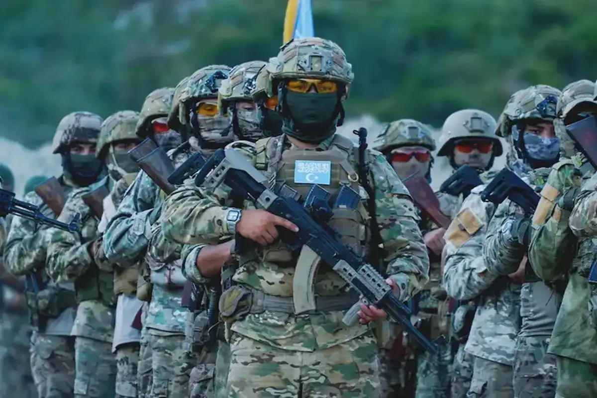 مقاتلين من الإيغور للصين